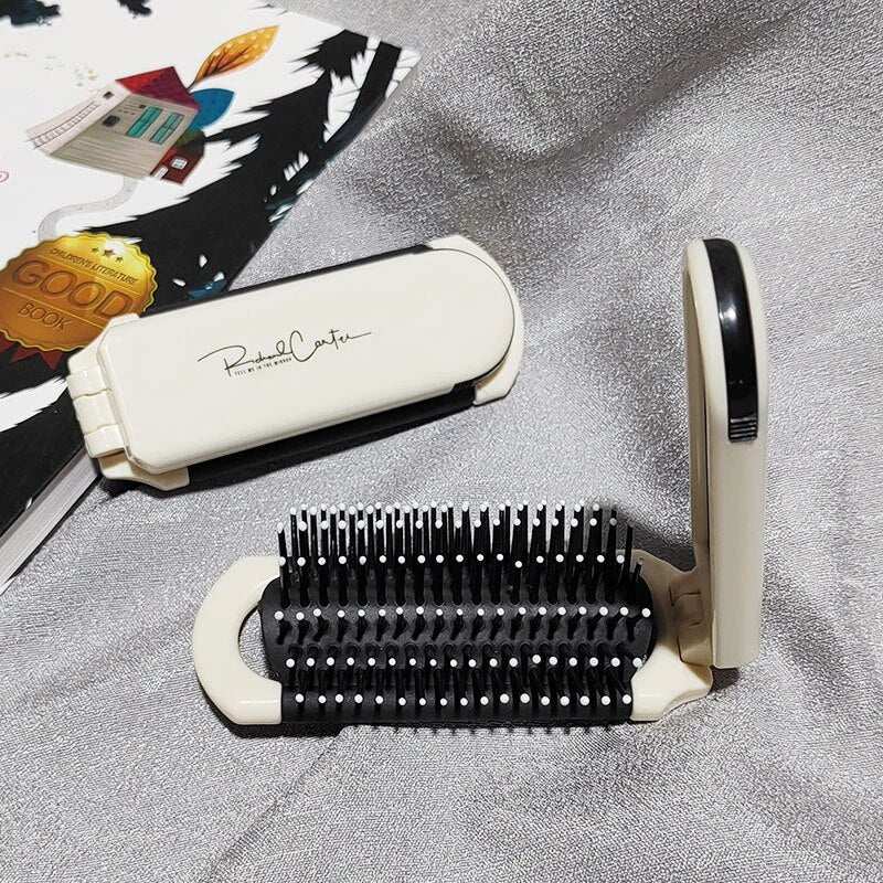 Compact hairbrush with integrated mirror | Kalsten