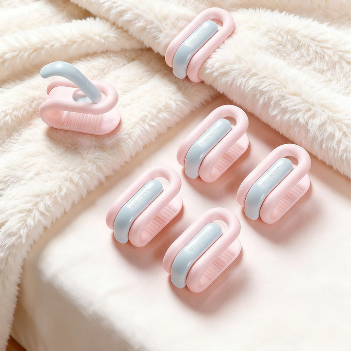 Duvet clips without needles