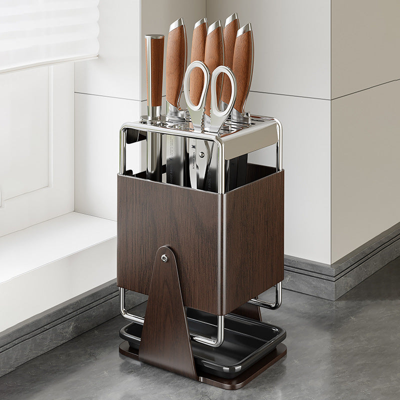Rotating knife block made of stainless steel with accessories