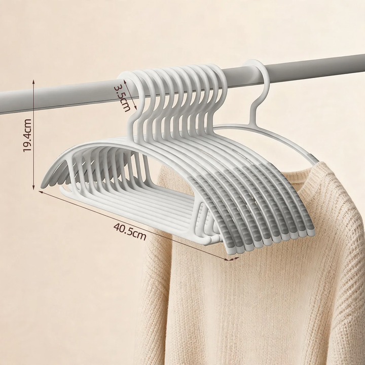 Plastic clothes hanger with anti-slip protection