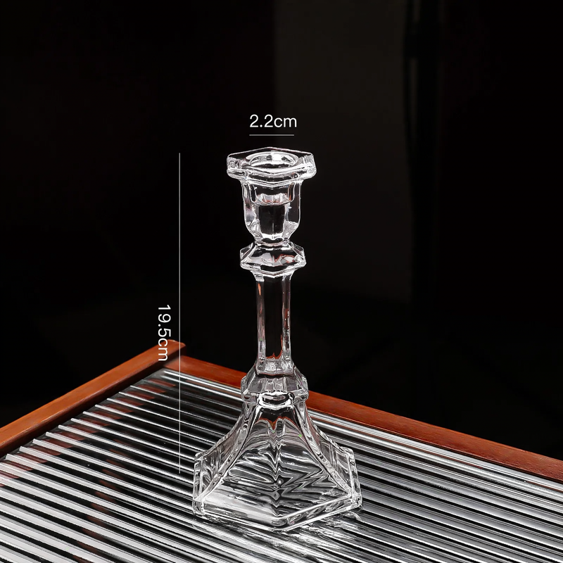 Glass candle holders in various shapes