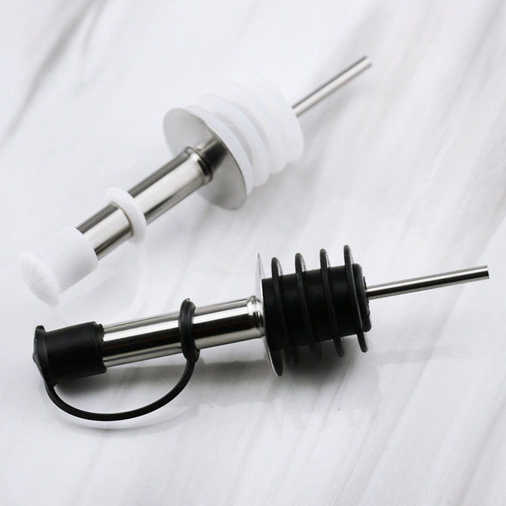 Stainless steel pourer for oil and vinegar bottles