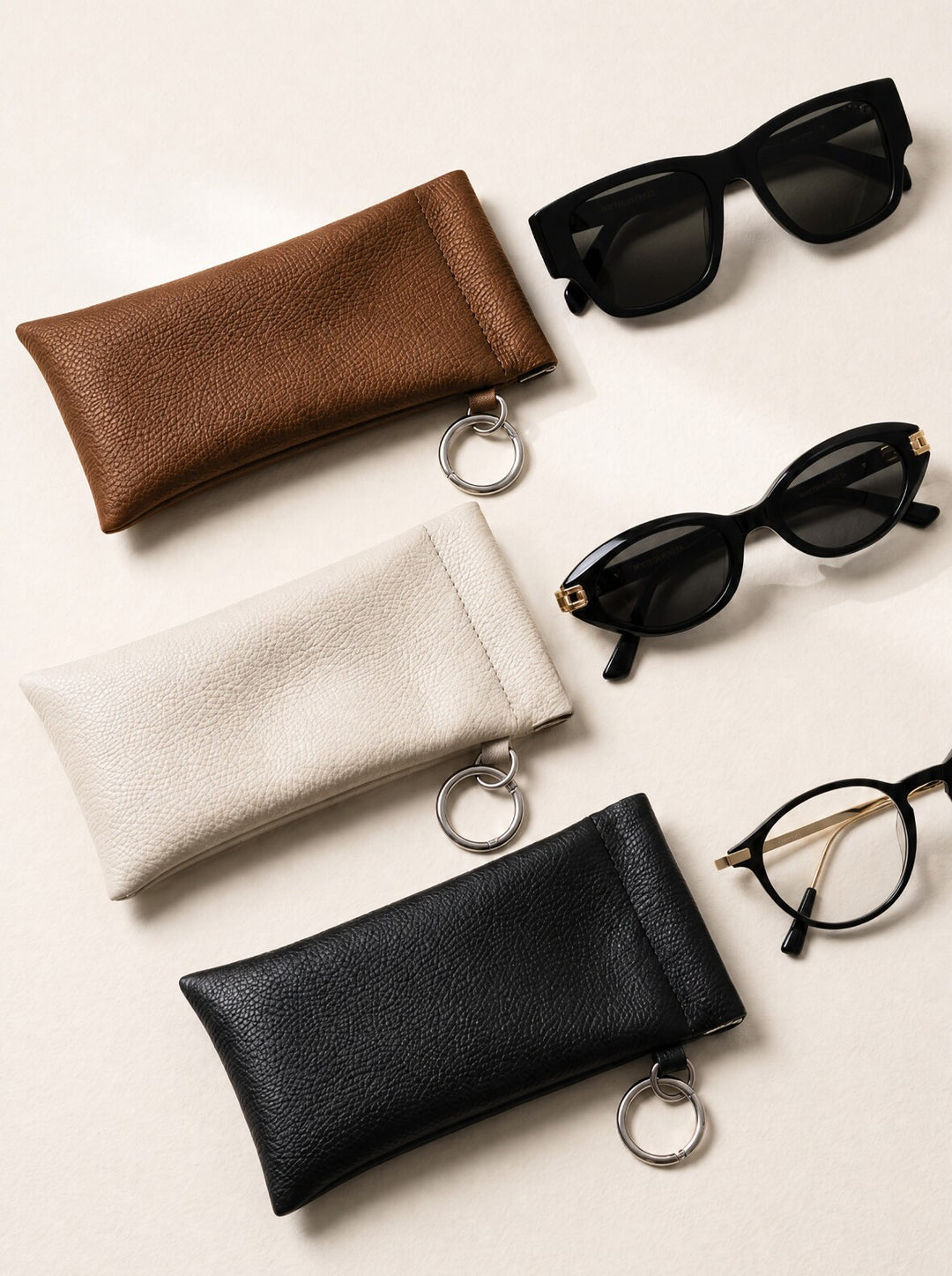 Leather glasses case with cleaning cloth and hangtag
