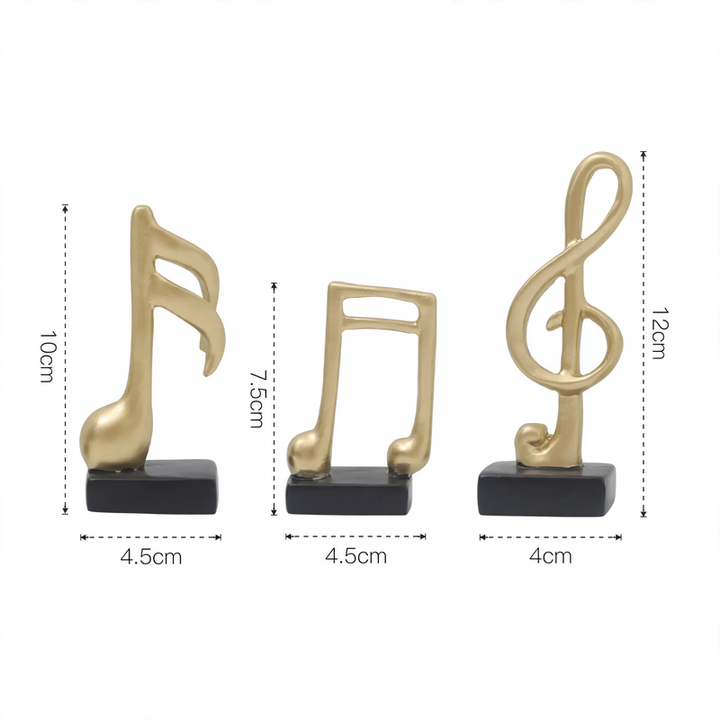 Three music note figures, resin, modern