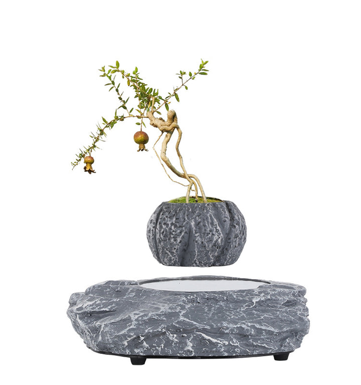 Magnetically levitating Bluetooth speaker with ambient light