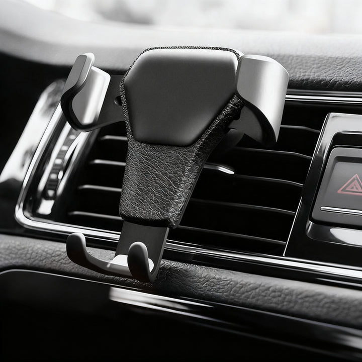 Car phone holder for the ventilation