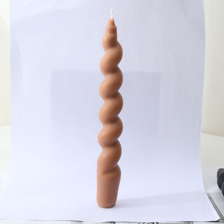 Spiral-shaped decorative candle made of soy wax