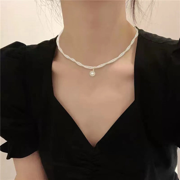 Pearl necklace with silver clasp, pearls 4–12 mm