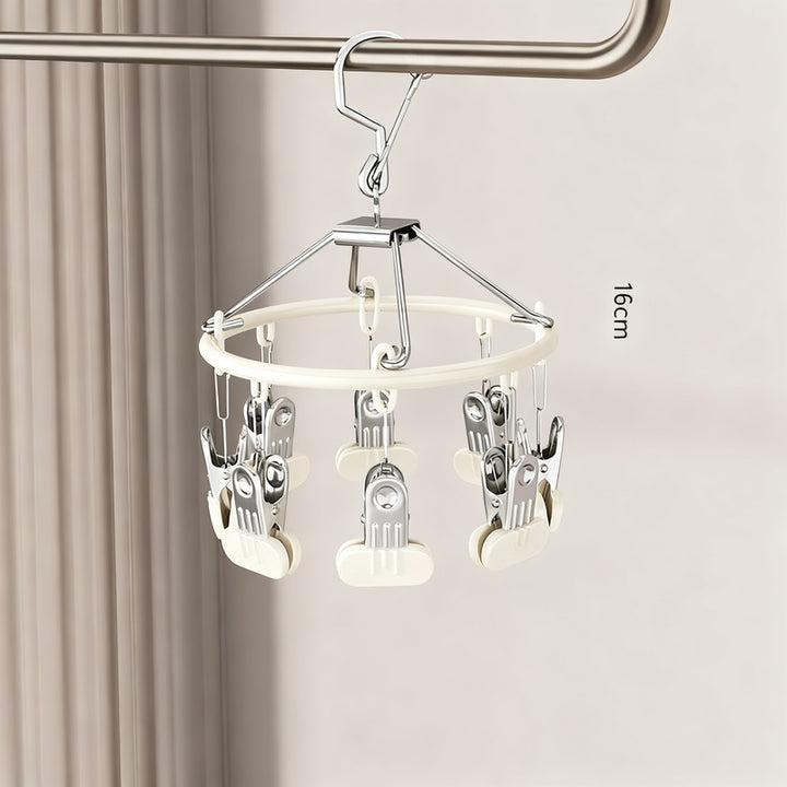 Clothes drying rack with clips
