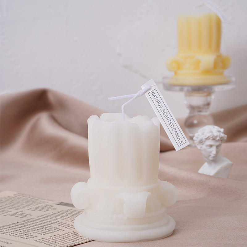 Handmade scented candle made of soy wax, pillar shape