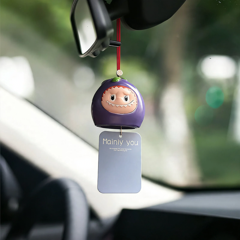 Scent hanger for rearview mirror with monster motif