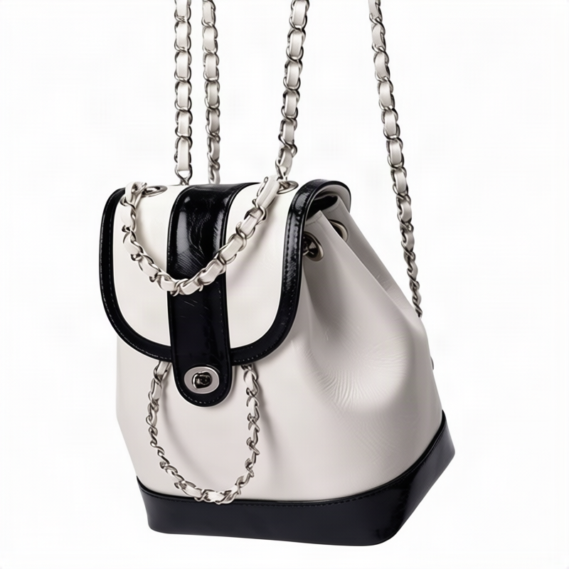 Compact backpack made of PU with chain decoration
