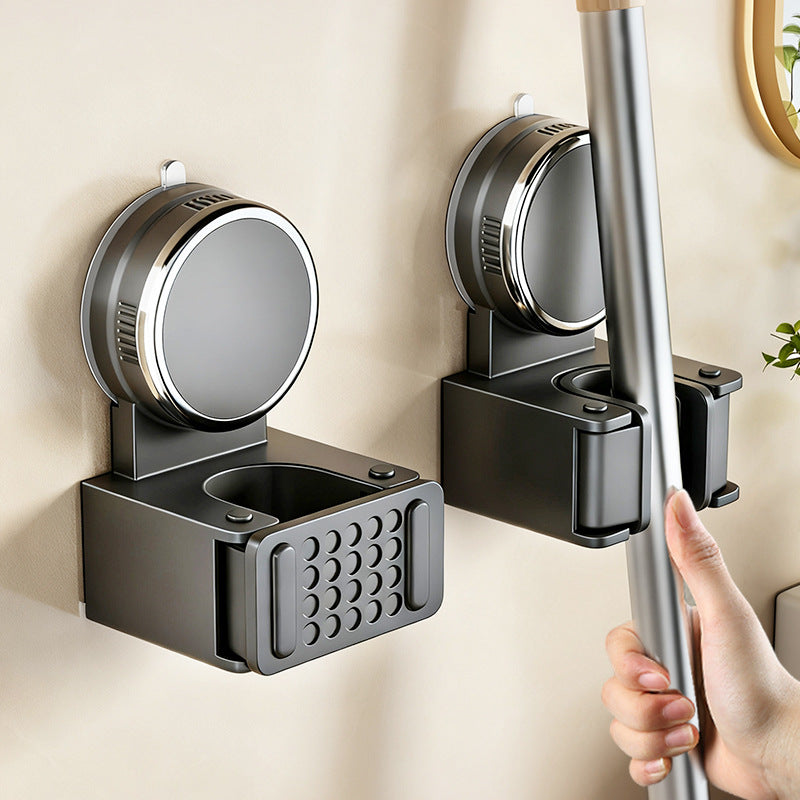 Suction cup holder for brooms and cloths, ABS