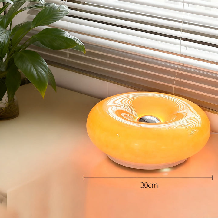 Donut-shaped table lamp with color change