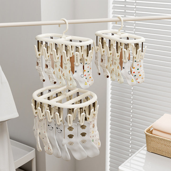 Clothes drying rack with multiple clips for hanging