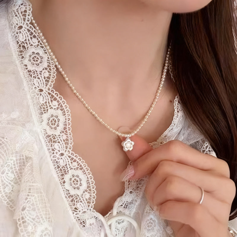 Pearl necklace with silver clasp, pearls 4–12 mm