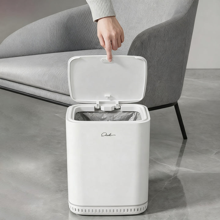 Trash can with lid and automatic bag holder