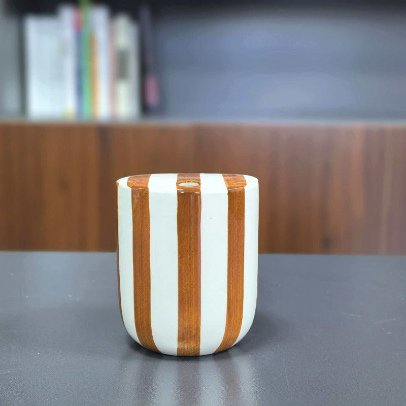 Ceramic coffee mug with hand-painted stripes