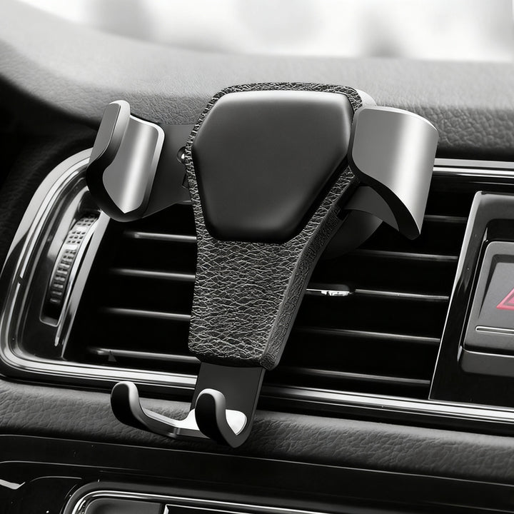 Car phone holder for the ventilation