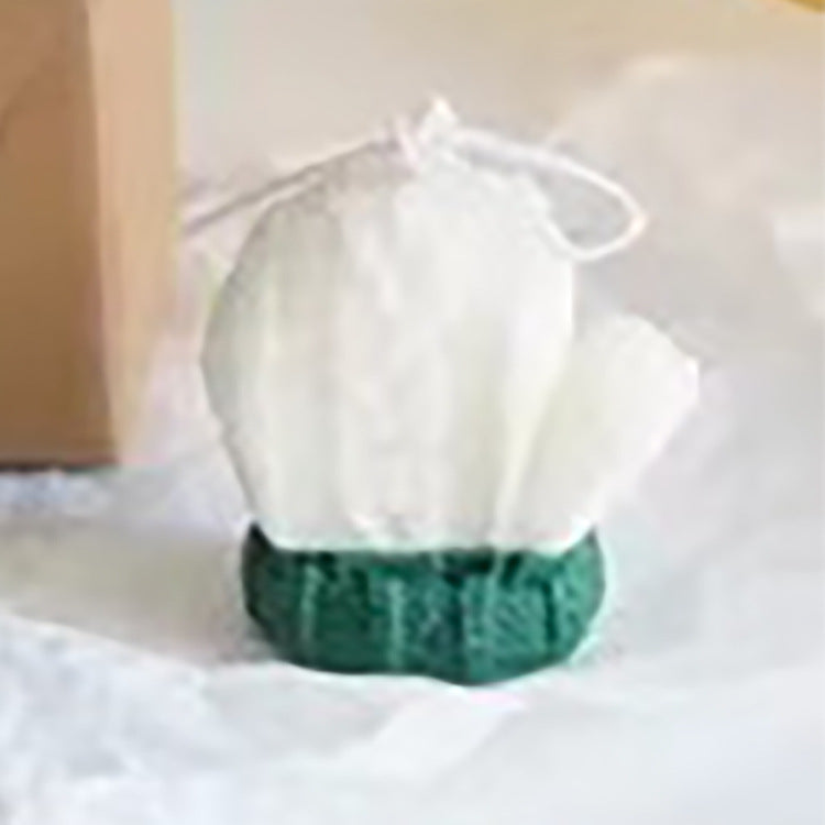Handcrafted scented candle made of soy wax, fruit shape