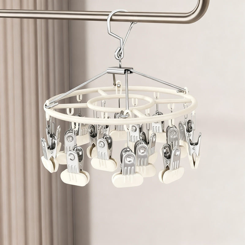 Clothes drying rack with clips