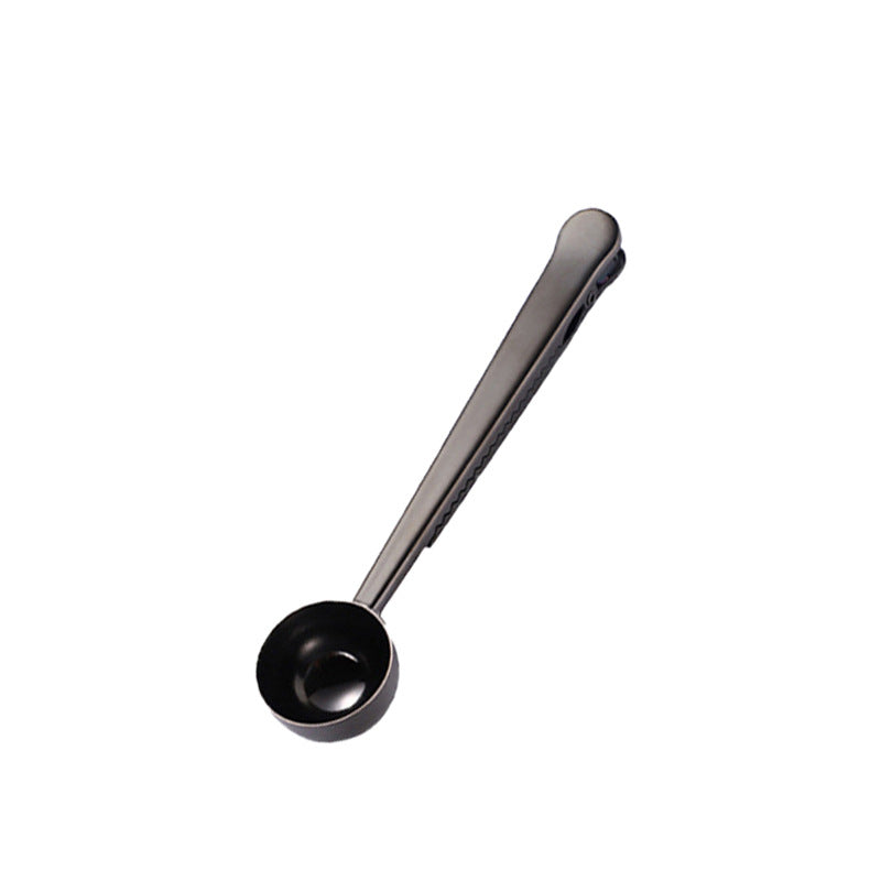 Stainless steel measuring spoons with closure clip