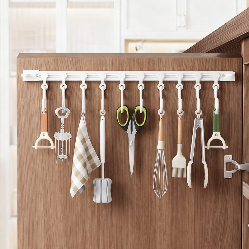 Track system with hooks for cabinet doors