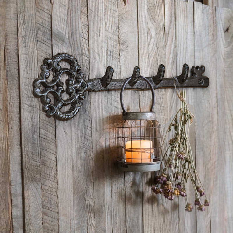 Iron wall hooks with key motifs