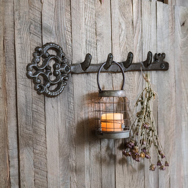 Iron wall hooks with key motifs