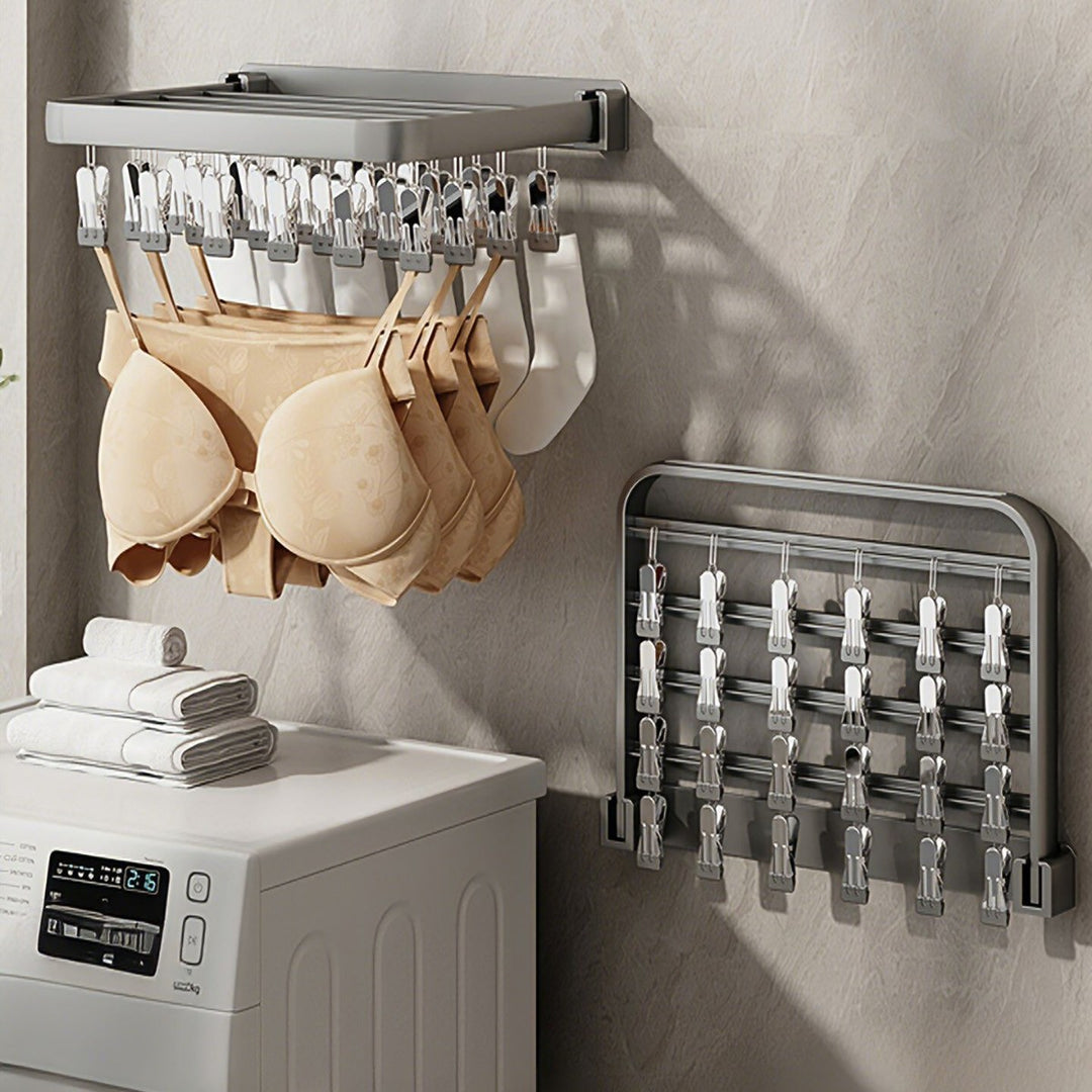 Wall-mounted clothes dryer with clamps