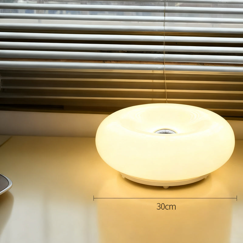 Donut-shaped table lamp with color change