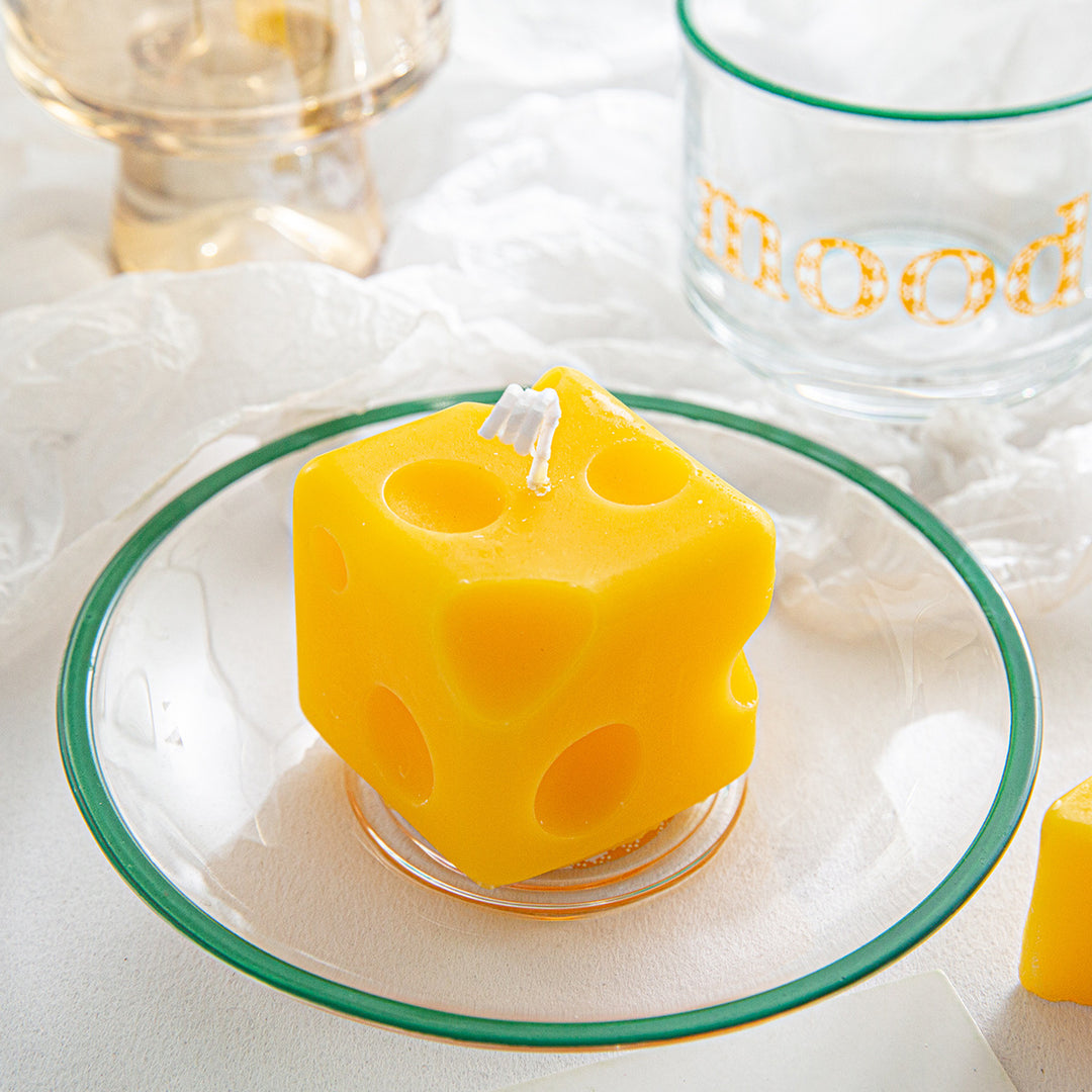 Scented candle in cheese shape made of soy wax
