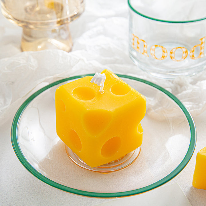 Scented candle in cheese shape made of soy wax