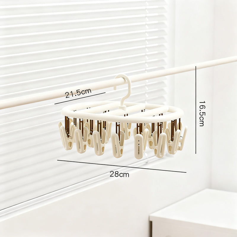 Clothes drying rack with multiple clips for hanging