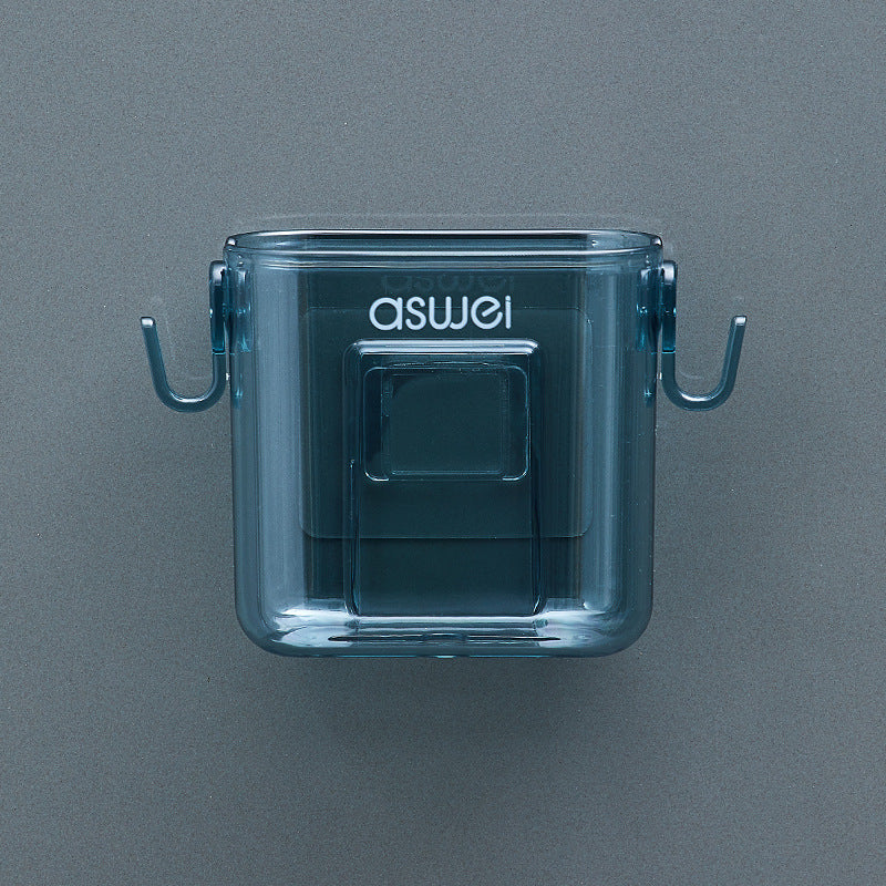 Wall-mounted storage box for remote controls and phones