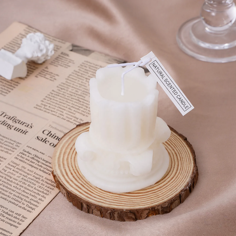 Handmade scented candle made of soy wax, pillar shape