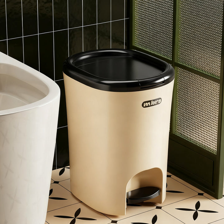 Plastic trash can with foot pedal and lid