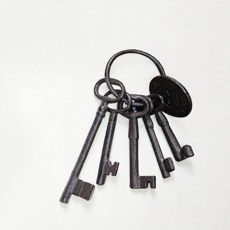 Iron wall hooks with key motifs