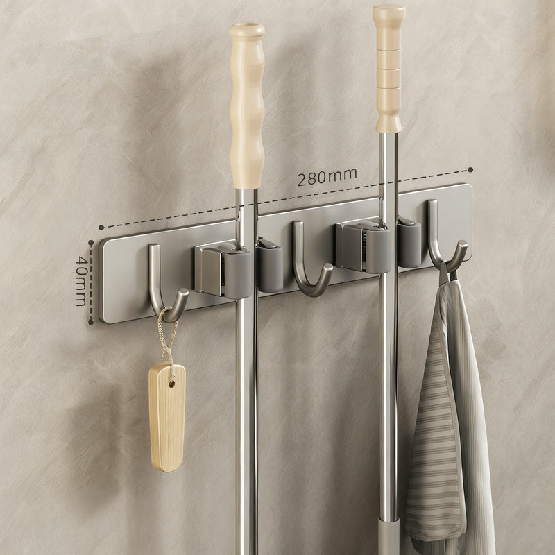 Wall bracket for brooms and mops made of stainless steel