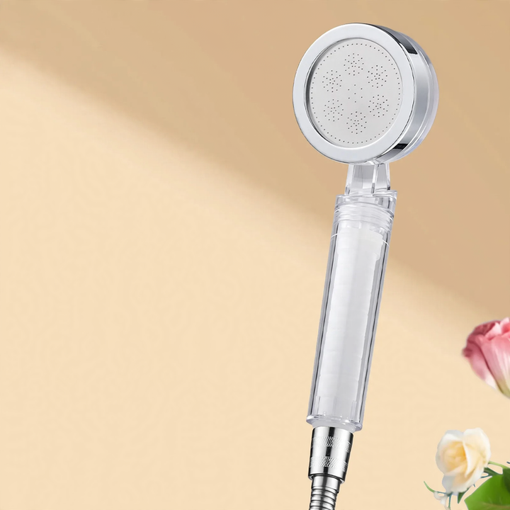 Portable shower head with pressure boost and filter