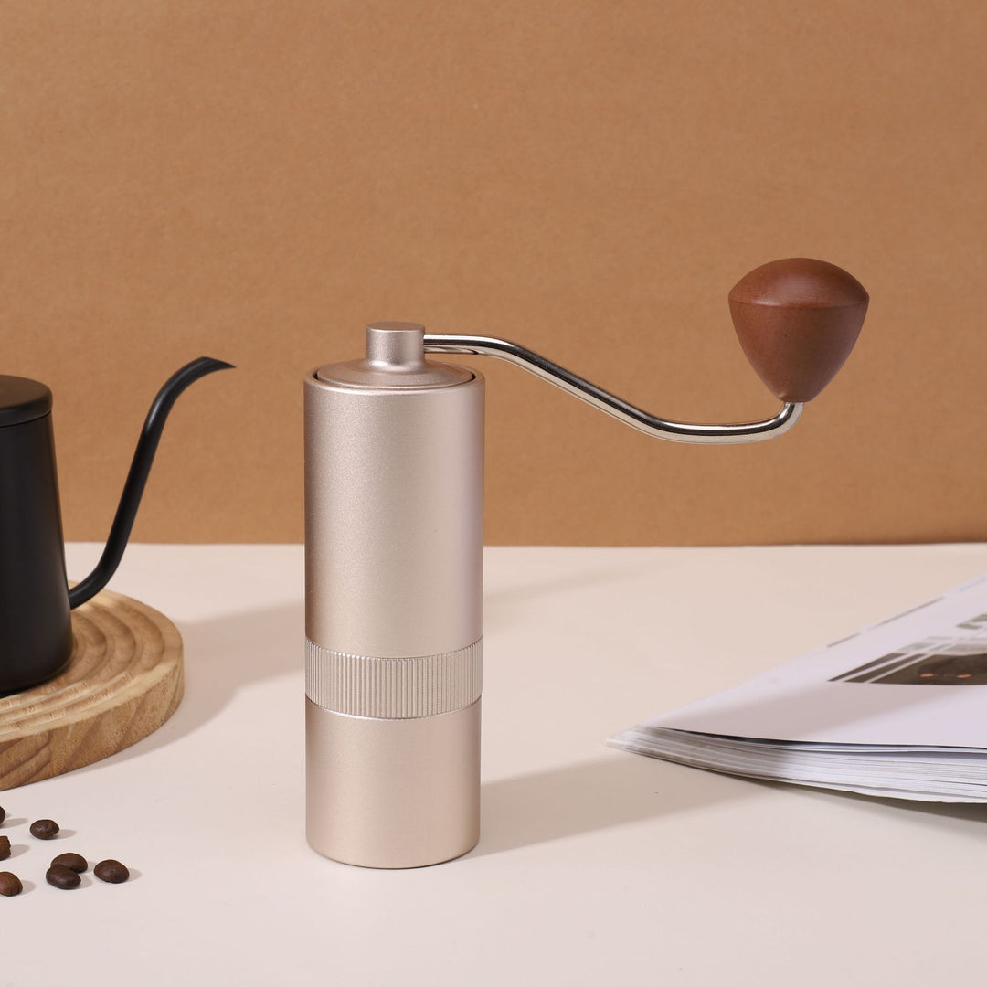 Hand coffee grinder with CNC grinding mechanism and brush