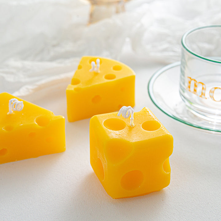 Scented candle in cheese shape made of soy wax