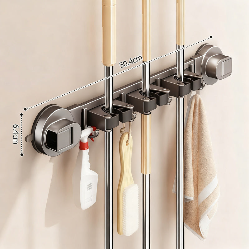 Suction cup holder for brooms and cleaning tools