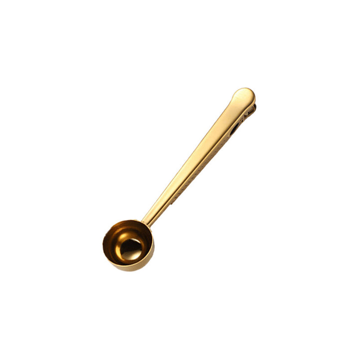 Stainless steel measuring spoons with closure clip