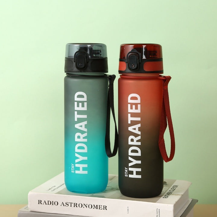 Sports water bottle with flip top, 750–1000 ml