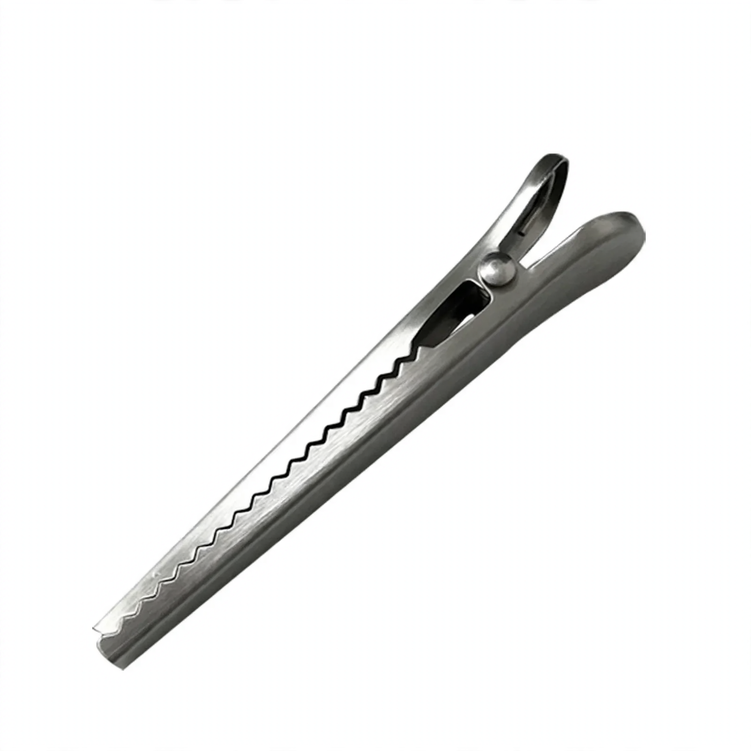 Stainless steel closure clip for bags