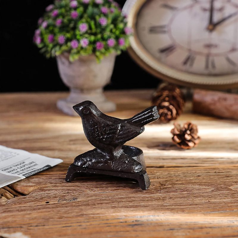 Cast iron candle holder, various designs