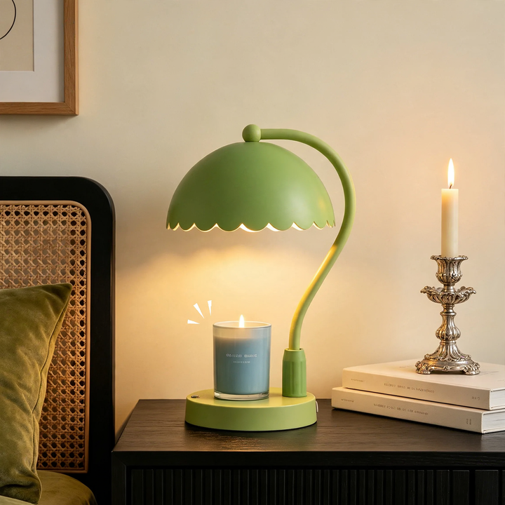 Table lamp with scented candle and lever mechanism