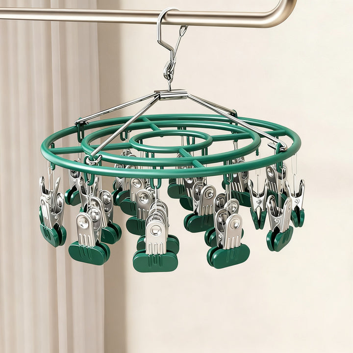 Clothes drying rack with clips