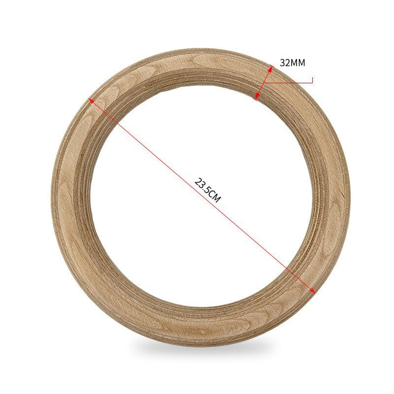 Wooden gymnastics rings with strap